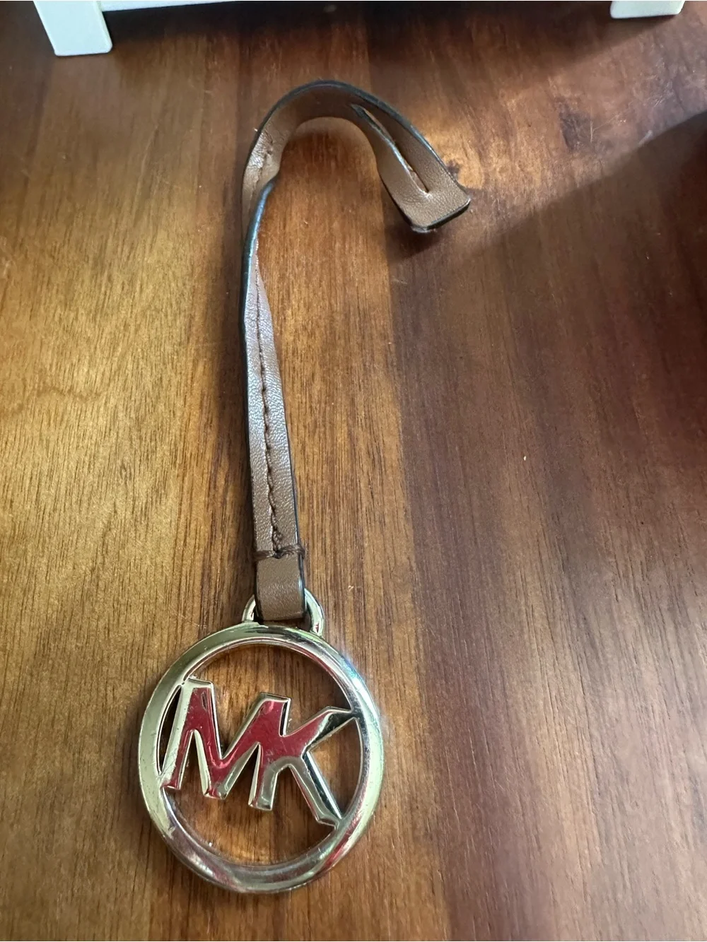 Michael Kors Brown Leather Strap Keyring with Gold MK Emblem and Red Inset